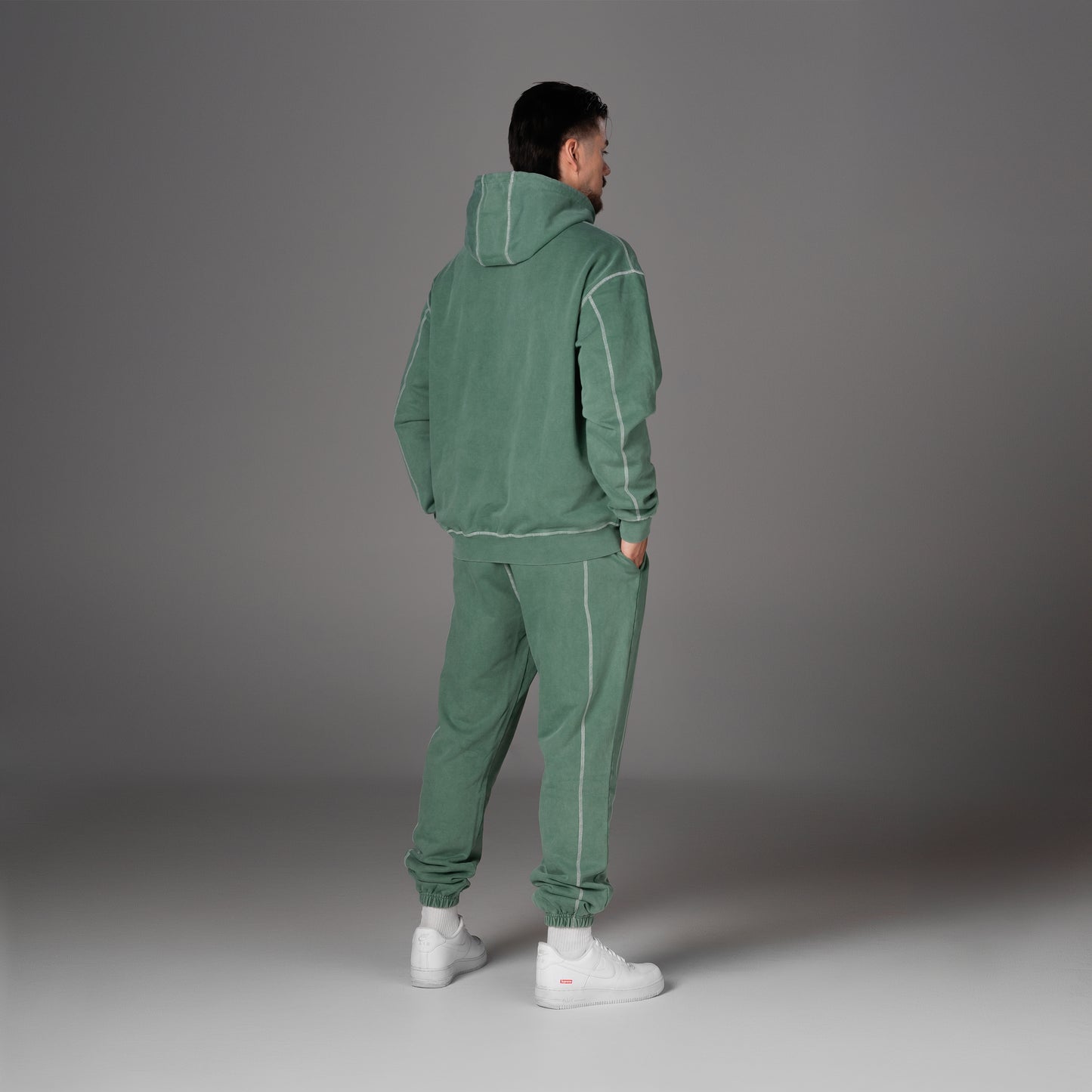 Flossy acid wash green set, back view showing relaxed fit