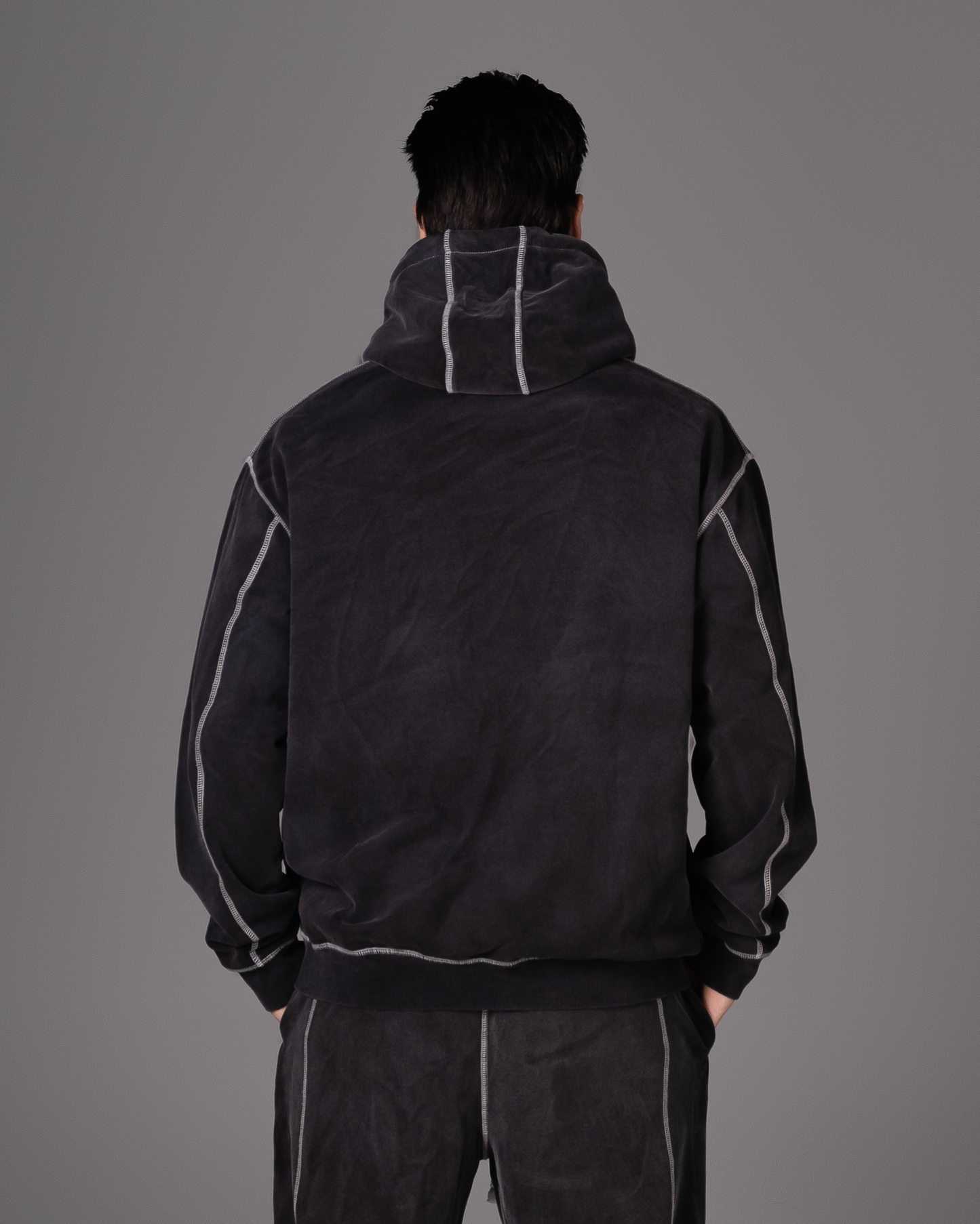 Flossy acid wash black hoodie, back view showing structured fit