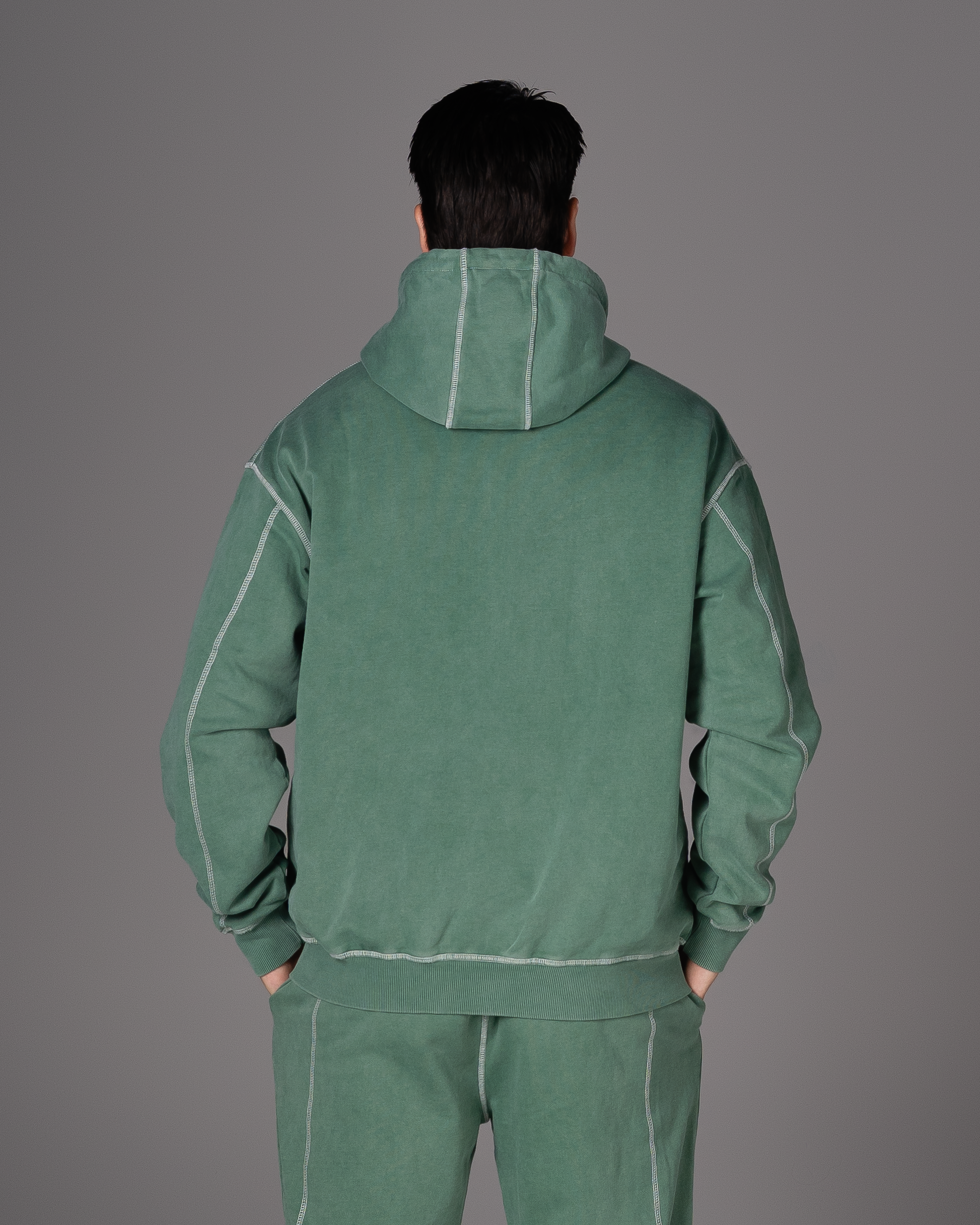 Flossy acid wash green hoodie, back view showing relaxed fit
