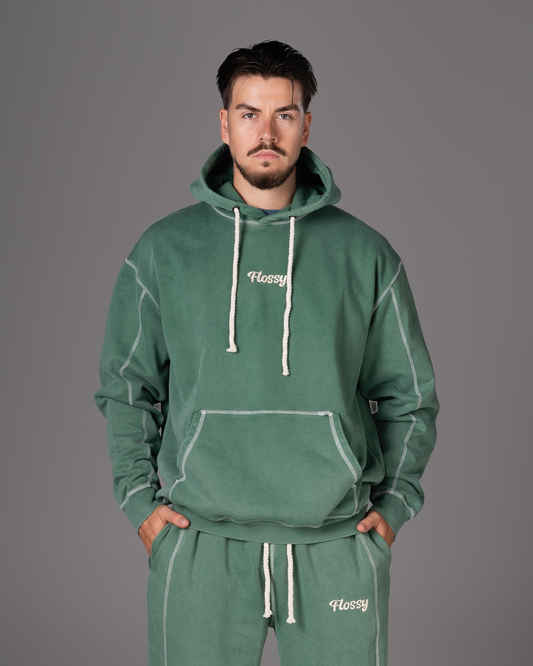 Flossy acid wash green hoodie with embroidered logo at chest, front view