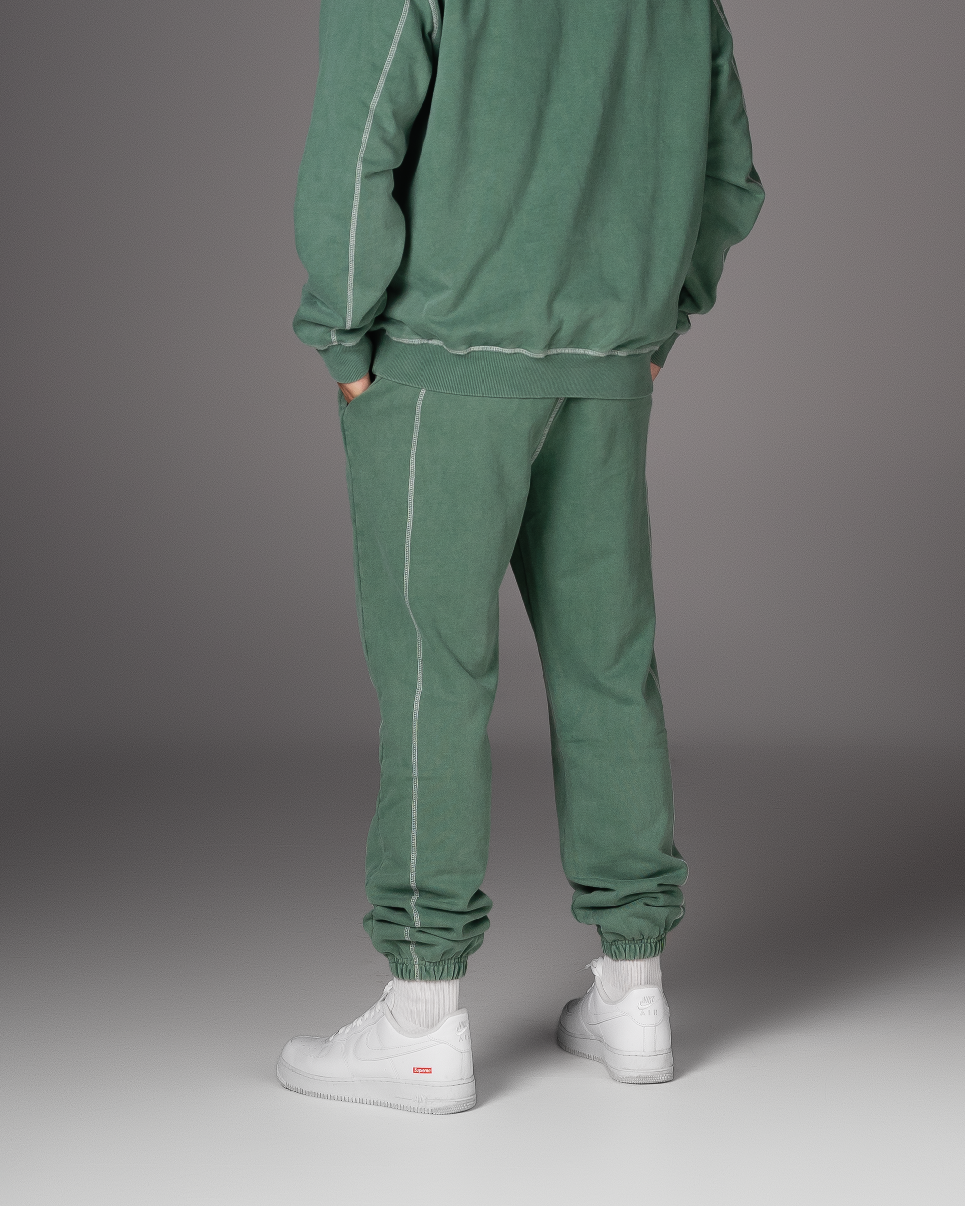 Flossy acid wash green joggers, back view showing structured fit